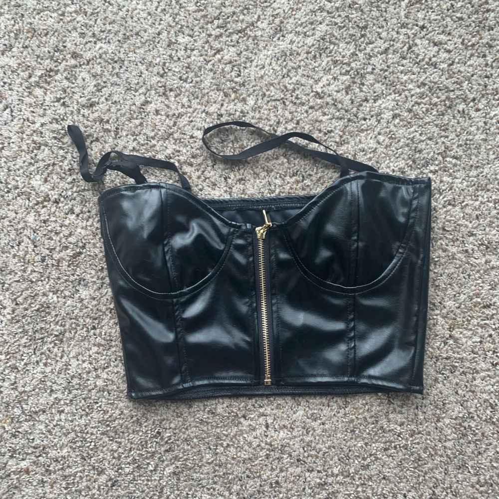 Black leather top with tags on